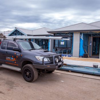 Pickup in front of in progress house